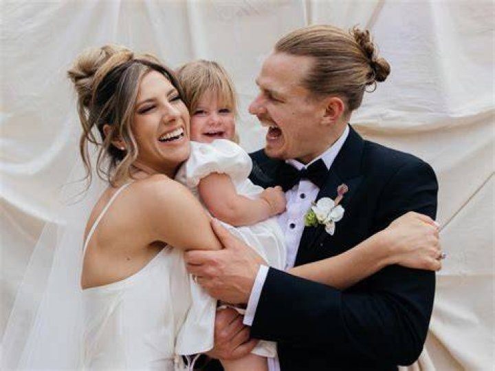 Mimi Gibbs and Woody Whitelaw with their baby 