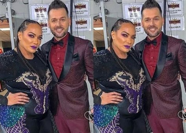 Nia Jax and Mike Rome in a single frame
